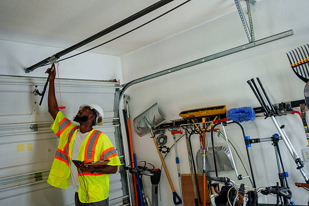 Professional Garage Door Panel Replacement technician working in North Valley, NM